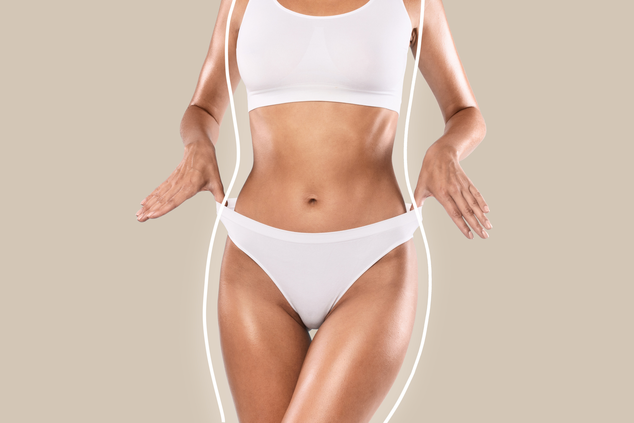 Woman highlighting body contours after liposuction.